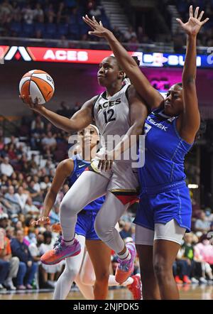 UNCASVILLE, CT - JUNE 15: Atlanta Dream forward Nia Coffey (12) in action  during the WNBA game between Atlanta Dream and Connecticut Sun on June 15,  2022, at Mohegan Sun Arena in