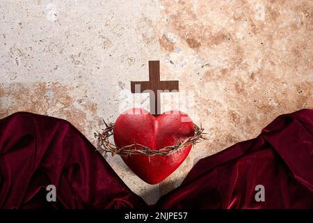Sacred Heart of Jesus, surrounded by a crown of thorns and with wooden ...