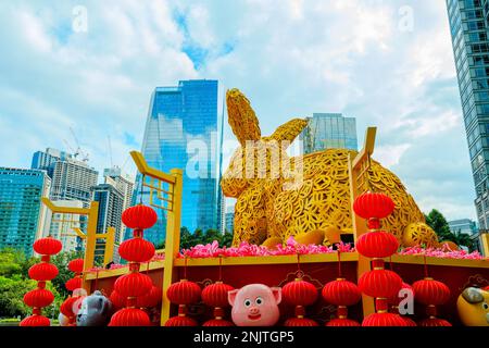 Kuala Lumpur, Malaysia - January 2023: For Chinese New Year 2023, Suria Mall of Petronas Towers features the statue of adorable golden rabbits Stock Photo