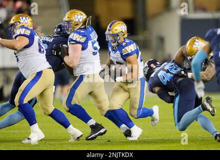 Winnipeg Blue Bombers' Greg McCrae (29) and Brady Oliveira (20) celebrate  Oliveira‚Äôs touchdown against the Edmonton Elks during first half CFL  action in Winnipeg on October 8, 2022. Oliveira will make his