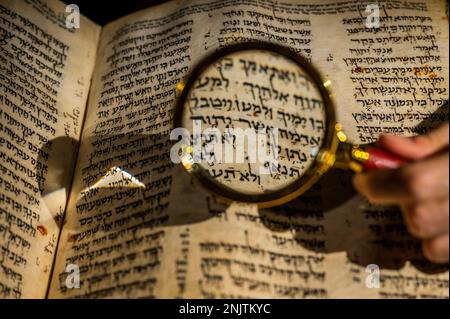 London, UK. 22 Feb 2023. Sotheby's Unveils Codex Sassoon: The earliest, most complete Hebrew Bible - more than 1,000 Years Old it is a bridge from Dead Sea Scrolls to The Bible of today. It will be sold In New York this May with an estimate of $30/50 Million, Making it the most valuable historical document or manuscript to appear at auction. It will be on Public View at Sotheby's London until 28 February. Composed of 24 books divided into three parts-the Pentateuch, the Prophets, and the Writings -the Bible makes the up the foundation for Judaism and the other Abrahamic faiths. Credit Guy Bell Stock Photo