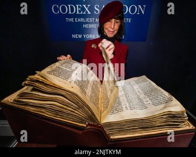 London, UK. 22 Feb 2023. Sotheby's Unveils Codex Sassoon: The earliest, most complete Hebrew Bible - more than 1,000 Years Old it is a bridge from Dead Sea Scrolls to The Bible of today. It will be sold In New York this May with an estimate of $30/50 Million, Making it the most valuable historical document or manuscript to appear at auction. It will be on Public View at Sotheby's London until 28 February. Composed of 24 books divided into three parts-the Pentateuch, the Prophets, and the Writings -the Bible makes the up the foundation for Judaism and the other Abrahamic faiths. Credit Guy Bell Stock Photo