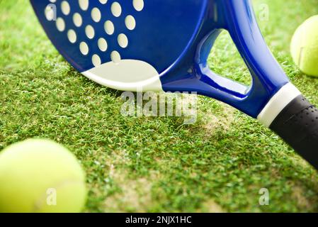 Padel Rackets And Balls On Artificial Grass Floor In Outdoor Court ...