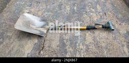 This shovel is used to lift the sand or lower the sand on the pick up car Stock Photo