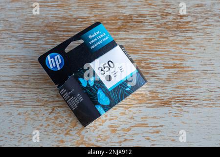 Replacement HP ink jet cartridges in packaging suggesting they're actually saving the planet Stock Photo