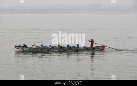 A traditional Cantabrian trainera racing rowing boat training in the bay of Santander Cantabria Spain Stock Photo