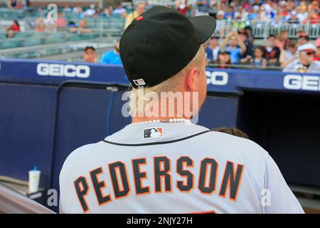 ATLANTA, GA - JUNE 20: Former Brave Joc Pederson #23 of the San Francisco  Giants and his daughter Poppy prior to the Monday evening MLB game between  the Atlanta Braves and the