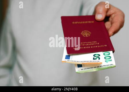 bribemoney in German passport, Germany Stock Photo