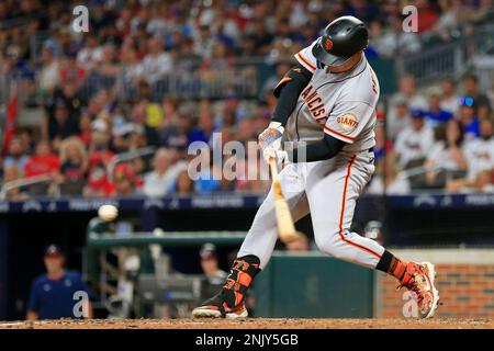 ATLANTA, GA - JUNE 20: Former Brave Joc Pederson #23 of the San Francisco  Giants and his daughter Poppy prior to the Monday evening MLB game between  the Atlanta Braves and the