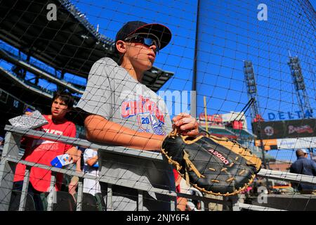 ATLANTA, GA - JUNE 20: Former Brave Joc Pederson #23 of the San Francisco  Giants and his daughter Poppy prior to the Monday evening MLB game between  the Atlanta Braves and the