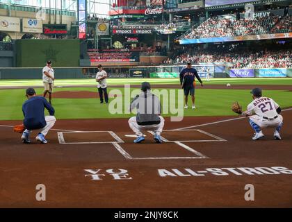 HOUSTON, TX - JUNE 19: (left to right) Houston Astros manager Dusty Baker Jr.  (12) speaks to University of Houston head basketball coach Kelvin Sampson  during the MLB game between the New