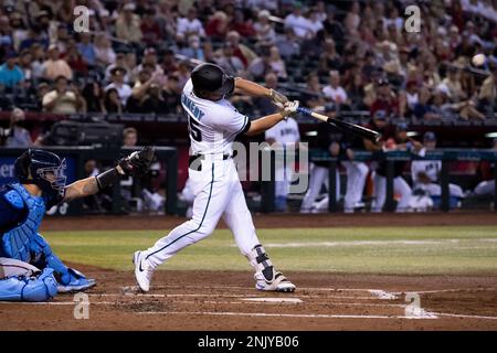 PHOENIX, AZ - JUNE 19: Arizona Diamondbacks Infielder Buddy Kennedy (45)  and his dad, Buddy Kennedy hug after a Father's Day MLB game between the  Minnesota Twins and the Arizona Diamondbacks on