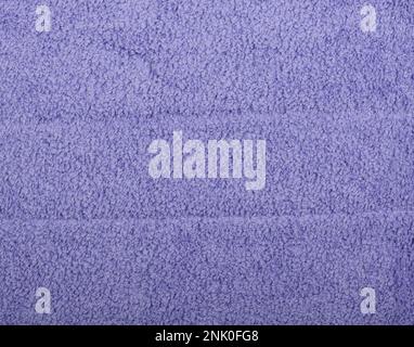 Close up teal blue microfiber washcloth, household cleaning wipe or towel background texture Stock Photo
