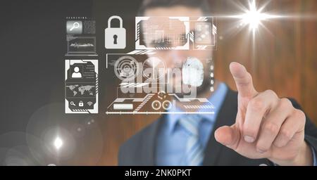 Composition of businessman touching screen with digital icons and biometric fingerprint. global online identity and digital interface concept digitall Stock Photo