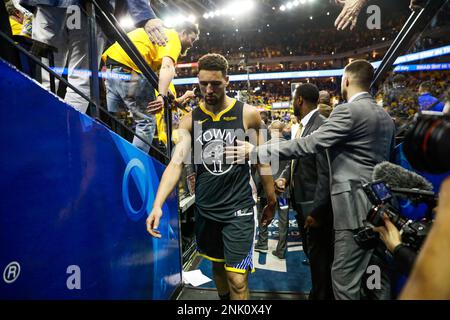 Klay Thompson walks off the court after losing Game 4 of the NBA Finals  between the Golden State Warriors and the Toronto Raptors at Oracle Arena  in Oakland, California, on Friday, June