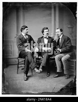 Mark Twain (Samuel L. Clemens) center George Alfred Townsend on his right, David Gray on his left Stock Photo