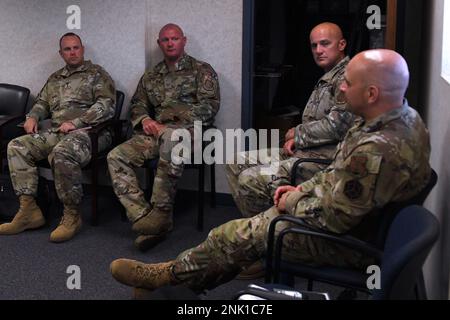 Members of the 134th Air Refueling Wing, Tenn., sit together during a brainstorming meeting with members of the 144th Maintenance Group, not pictured, Aug. 10, 2022, at the Fresno Air National Guard Base, Calif. The Tennessee Guardsmen were invited to view the capabilities of the Adaptive Basing Trailer prototype and to discuss methods on how to execute the ACE concept at their unit. 134th Air Refueling Wing,144th Fighter Wing,adaptive basing trailer,collaboration,maintenance,partnerships, Stock Photo