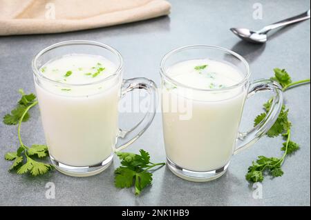 Buttermilk drink served in glass cups Stock Photo