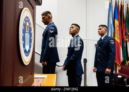 Students wait in line to receive their wings during a graduation ceremony for the Inter-American Air Forces Academy, Aug 8, 2022 at Joint Base San Antonio - Lackland. Approximately 200 students from 10 partner nations and the U.S. graduated from IAAFA during B-Cycle graduation. Stock Photo