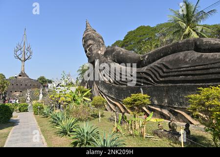View of the statue of a reclining Buddha inside Buddha park in Vientiane, Lao Stock Photo