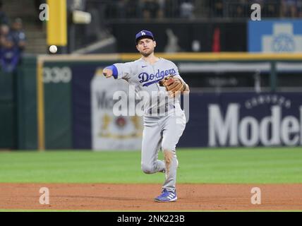 Infielder Trea Turner of the Los Angeles Dodgers throws a ball into