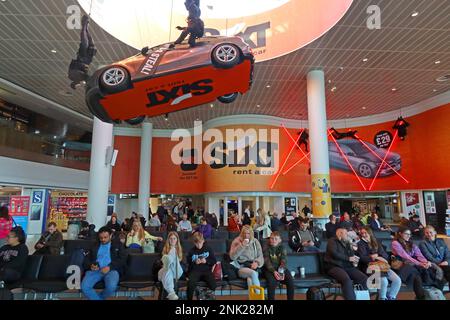 Sixt vehicle lease / rental promotion at Manchester Airport, Its a deal, Its a steal - channelling Mission Impossible Stock Photo