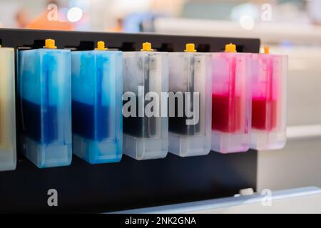 Row of inkjet printer CMYK cartridges - close up Stock Photo