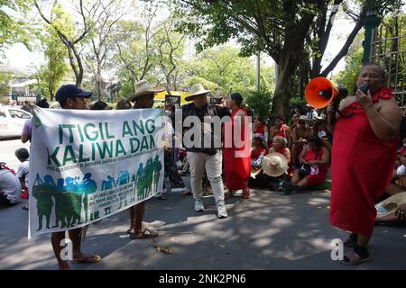 Quezon City, Philippines. 23rd February, 2023. Around 300 indigenous people (IP) belonging to Dumagat-Remontado tribe, together with environmental groups and advocates staged a protest outside the Department of Environment and Natural Resources in Quezon City. They reiterate their call against the construction of the New Centennial Water Source–Kaliwa Dam Project (NWCP-KDP), in the borders of Rizal and Quezon Province. The mega-dam project will be submerging almost hundred hectares of ancestral lands that will cause irreparable loss of sacred sites, forests, biodiversity and communities. (Cred Stock Photo