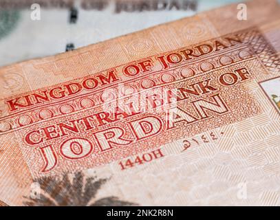 Macro detail picture with Five Jordanian dinar banknote. JOD is the official currency in The Hashemite Kingdom of Jordan. Selective focus. Stock Photo