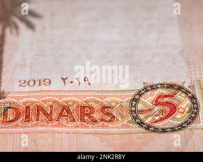 Macro detail picture with Five Jordanian dinar banknote. JOD is the official currency in The Hashemite Kingdom of Jordan. Selective focus. Stock Photo