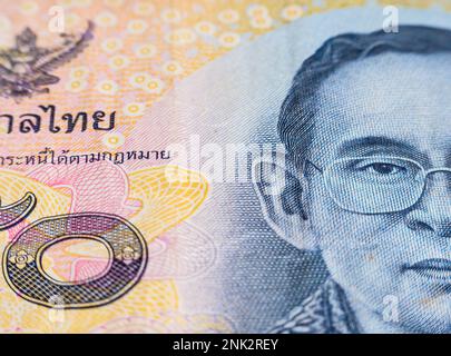 Macro detail with a 50 Thai Baht banknote. the baht is the official currency of Thailand Stock Photo