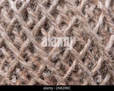 Close up macro with threads twisted together in a ball of strings. Stock Photo