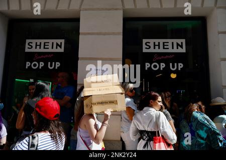 Several people queue to enter SHEIN's first physical store in Madrid, June  2, 2022, in Madrid (Spain). Chinese 'online' fashion brand Shein opens its  first 'pop up store' in Madrid after the