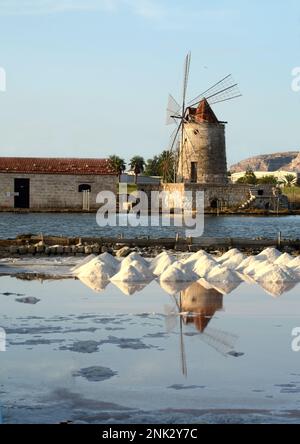 The Saline di Trapani and Paceco oriented nature reserve is a protected natural area in Sicily where the ancient sea salt extraction activity takes pl Stock Photo