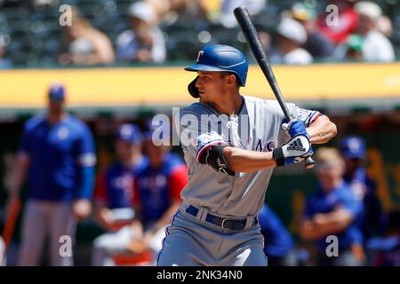 Texas Rangers shortstop Corey Seager (5) swings at a pitch during the fifth  inning against the Oakland Athletics in Oakland, CA Thursday May 26, 2022  Stock Photo - Alamy