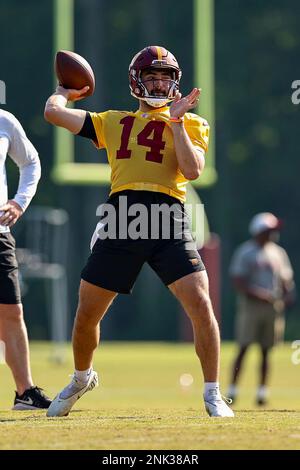 LOUDOUN COUNTY, VA - JUNE 01: Carson Wentz (11) of the Washington Commanders  passes the ball during the Washington Commanders OTA on June 1, 2022 at the  Park in Ashburn, Virginia. (Photo