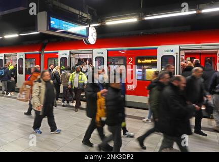 Busy DB Regio Mitte EMU electric train Frankfurt Airport, integrated train station,platform for services to Mainz,Wiesbaden and Koblenz, Hess, Germany Stock Photo