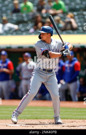 Oakland, USA. 26th May, 2022. Texas Rangers right fielder Kole Calhoun (56)  swings at a pitch during the second inning against the Oakland Athletics in  Oakland, CA Thursday May 26, 2022. (Image