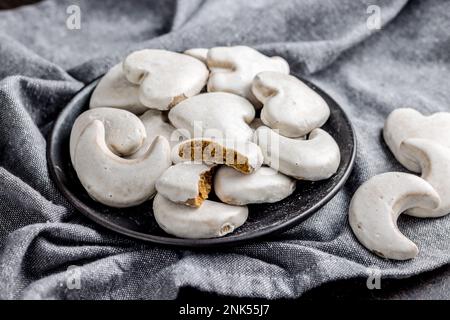 Gingerbread cookies with the sugar icing on the plate. Stock Photo