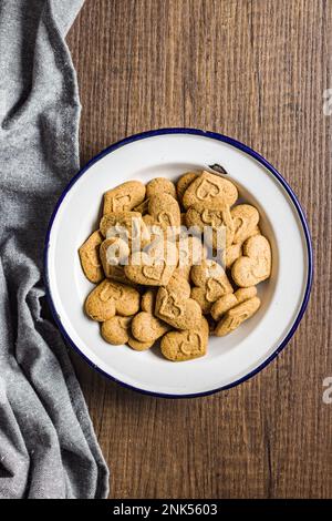 Sweet gingerbread hearts on the plate. Top view. Stock Photo