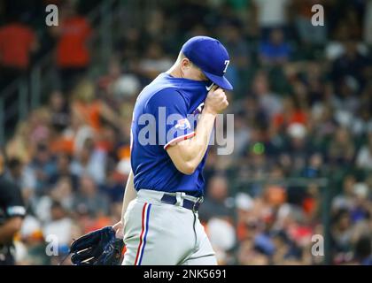 Texas Rangers bullpen catcher Josh Frasier throws during spring training  baseball practice Sunday, Feb. 19, 2023, in Surprise, Ariz. (AP  Photo/Charlie Riedel Stock Photo - Alamy