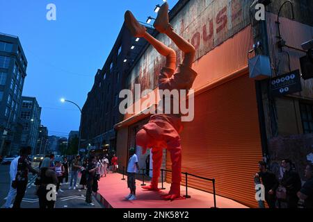 Visitors waiting in line to go into the Louis Vuitton and Nike Air Force 1  by Virgil Abloh exhibition at the Greenpoint Terminal Warehouse in  Greenpoint. Brooklyn.New York City.USA Stock Photo 