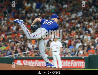 Texas Rangers bullpen catcher Josh Frasier throws during spring training  baseball practice Sunday, Feb. 19, 2023, in Surprise, Ariz. (AP  Photo/Charlie Riedel Stock Photo - Alamy