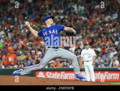 Texas Rangers bullpen catcher Josh Frasier throws during spring training  baseball practice Sunday, Feb. 19, 2023, in Surprise, Ariz. (AP  Photo/Charlie Riedel Stock Photo - Alamy