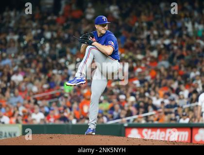 Texas Rangers bullpen catcher Josh Frasier throws during spring training  baseball practice Sunday, Feb. 19, 2023, in Surprise, Ariz. (AP  Photo/Charlie Riedel Stock Photo - Alamy