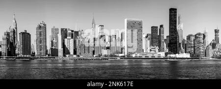 New York, USA - August 23, 2015: skyline of New York seen from east river. The East River is a salt water tidal strait in New York City. The waterway Stock Photo