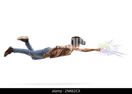 Full length profile shot of a young african american man with a vr headset flying and touching data diagram isolated on white background Stock Photo