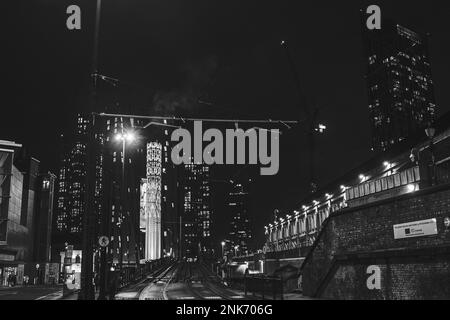 Manchester, England - February 02.2022, city on the night, black and white. Stock Photo