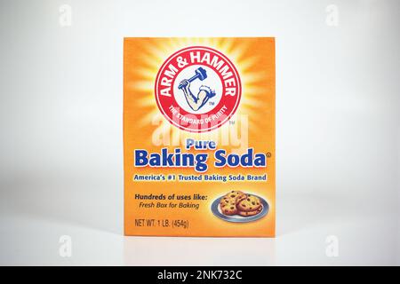 New York, NY - October 5, 2021: Arm Hammer brand baking soda in orange box isolated on a white background Stock Photo