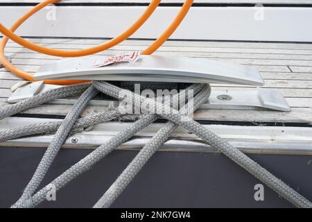 Rope on the mooring line in safe harbor Stock Photo